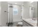 A well-maintained bathroom featuring a shower-tub combo with stylish curtain and a functional vanity at 1976 Harvest Landing Cir, Lakeland, FL 33810