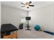 Bedroom showcasing a massage table, stationary bike, and weights for a great workout at 1976 Harvest Landing Cir, Lakeland, FL 33810