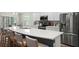 Bright, modern kitchen with stainless steel appliances and a large center island at 1976 Harvest Landing Cir, Lakeland, FL 33810
