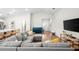 Spacious living room with vaulted ceiling and an open floor plan design at 1976 Harvest Landing Cir, Lakeland, FL 33810