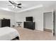 Primary bedroom showcasing great space, a closet and seamless bathroom access at 1976 Harvest Landing Cir, Lakeland, FL 33810