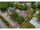 Aerial view of the property highlighting the surrounding neighborhood and large lot at 208 Lake Dale Dr, Auburndale, FL 33823