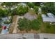 Aerial view of the property highlighting the surrounding neighborhood and lot at 208 Lake Dale Dr, Auburndale, FL 33823