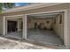Interior view of a detached, oversized two-car garage, offering ample storage and workshop space at 208 Lake Dale Dr, Auburndale, FL 33823