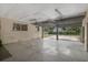 Interior view of a detached, oversized two-car garage featuring a high ceiling at 208 Lake Dale Dr, Auburndale, FL 33823