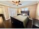 Comfortable bedroom with ceiling fan, wood floors and a big closet at 217 Shore Loop, Winter Haven, FL 33884