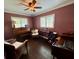 Inviting office space with multiple chairs, dark wood floors, and natural light at 217 Shore Loop, Winter Haven, FL 33884