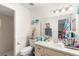 Well-lit bathroom featuring a large mirror, vanity, and walk-in shower at 2282 Firestone Pl, Winter Haven, FL 33884