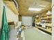 Basement with workbench and storage shelves at 2418 W 1St St, Sanford, FL 32771