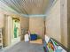 Unfinished basement with corrugated metal ceiling and concrete floor at 2418 W 1St St, Sanford, FL 32771