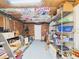 Spacious unfinished basement with storage racks, painting ceiling, and an open layout at 2418 W 1St St, Sanford, FL 32771