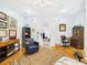 View through doorway into bedroom featuring hardwood floors and natural light at 2418 W 1St St, Sanford, FL 32771