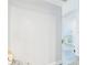 Hallway leading to bedroom area with modern flooring and light-filled atmosphere at 2418 W 1St St, Sanford, FL 32771