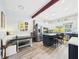 Bright kitchen featuring an island with seating, stainless steel appliances, and open layout for easy entertaining at 2418 W 1St St, Sanford, FL 32771