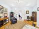 Cozy living room with wood floors, stylish furnishings, and bright natural light at 2418 W 1St St, Sanford, FL 32771