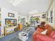 Open living room space with stained glass features and easy access to the outdoor deck at 2418 W 1St St, Sanford, FL 32771