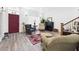 Well-lit living room showcasing a front door and traditional furnishings at 2418 W 1St St, Sanford, FL 32771