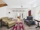 Spacious living room showcasing elegant furnishings, sliding doors, and ample natural light at 2418 W 1St St, Sanford, FL 32771