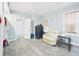 Well lit main bedroom with access to the main hall and natural light from a window at 2418 W 1St St, Sanford, FL 32771