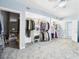 Bright main bedroom featuring a ceiling fan and ample closet space at 2418 W 1St St, Sanford, FL 32771