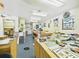 Well-lit studio boasts functional workspaces, with potential for various artistic or professional endeavors at 2418 W 1St St, Sanford, FL 32771