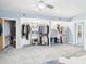 Expansive walk-in closet featuring ample shelving and hanging space, seamlessly connected to the main bedroom at 2418 W 1St St, Sanford, FL 32771