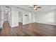 Spacious bedroom with ceiling fan and laminate floors at 2505 Brownwood Dr, Mulberry, FL 33860