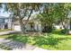 Charming single-story home with well-maintained lawn and mature trees at 2505 Brownwood Dr, Mulberry, FL 33860