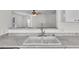 Kitchen view of sink and breakfast bar at 2505 Brownwood Dr, Mulberry, FL 33860