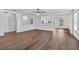 Spacious living room with hardwood floors and ample natural light at 2505 Brownwood Dr, Mulberry, FL 33860