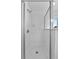 Walk-in shower features tiled walls and glass door at 2505 Brownwood Dr, Mulberry, FL 33860