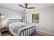 A comfortably decorated bedroom has a window for natural light and a ceiling fan at 4125 Sunny View Dr, Lakeland, FL 33813
