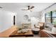 Bright living room featuring light hardwood floors and stylish decor at 4125 Sunny View Dr, Lakeland, FL 33813