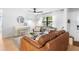 Bright and airy living room with a piano and a view of the outdoors at 4125 Sunny View Dr, Lakeland, FL 33813
