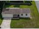 An overhead aerial view of a single-story home with attached garage and large front yard at 4921 Sharon Ave, Lakeland, FL 33812