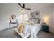 Spacious main bedroom with contemporary decor, plush carpet, and a ceiling fan at 4921 Sharon Ave, Lakeland, FL 33812