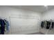 View of the walk-in closet with multiple clothes racks at 516 Ingleside Ln, Haines City, FL 33844