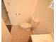 Cozy bathroom featuring tile floors, a neutral wall color, and a toilet at 520 Oakland Rd, Auburndale, FL 33823