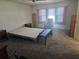 Bedroom with natural light, comfortable furniture, and neutral carpet flooring at 6685 Briarhill Dr Ne, Winter Haven, FL 33881