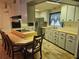 Bright kitchen with stainless steel appliances, a cooking island, and lots of cabinet space at 6685 Briarhill Dr Ne, Winter Haven, FL 33881