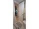 Bathroom featuring tile flooring, a toilet, and a marble topped half wall shower surround at 7201 Country Club Dr # G21, Lake Wales, FL 33898