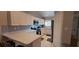 Bright kitchen featuring modern appliances, ample countertop space, and white cabinetry for a clean aesthetic at 7201 Country Club Dr # G21, Lake Wales, FL 33898