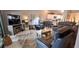 Inviting living room features leather furniture, and stylish decor accents including a fireplace and large rug at 7201 Country Club Dr # G21, Lake Wales, FL 33898
