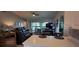 Spacious living room with comfortable seating, stylish decor, and lots of natural light for relaxation at 7201 Country Club Dr # G21, Lake Wales, FL 33898