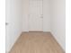 Entryway featuring tile flooring leading to a white front door at 2173 Emma Ln, Lake Wales, FL 33859