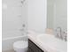 Clean bathroom with a tub, shower, and vanity at 322 Brennan Ave, Frostproof, FL 33843