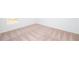 Spacious bedroom with neutral carpeting and an ensuite bathroom at 322 Brennan Ave, Frostproof, FL 33843