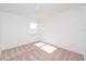 Spacious bedroom with neutral walls and carpeted floor at 322 Brennan Ave, Frostproof, FL 33843
