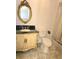 Bathroom featuring a vanity with an oval mirror and a shower with curtain at 1019 Grove St # 85, Maitland, FL 32751