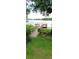 Private dock on the lake with wooden railings, perfect for relaxing and enjoying the natural scenery at 1019 Grove St # 85, Maitland, FL 32751